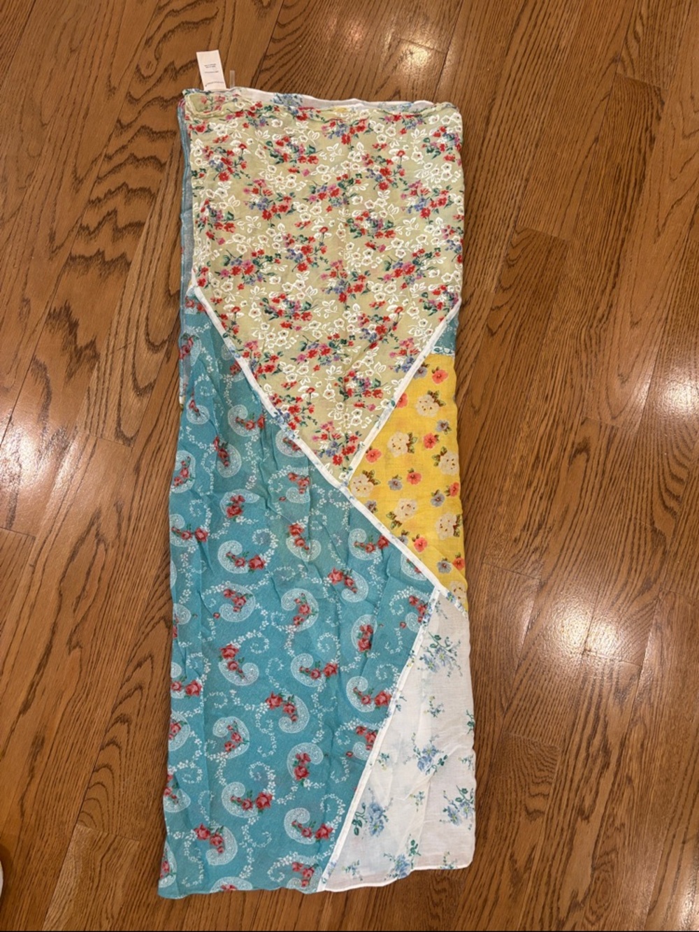 LoveShackFancy Floral Cotton Cover up in Blue, Red, White and Yellow.